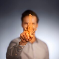 A man touches a digital key to Blum's service world.