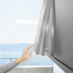 TIP-ON de Blum, ouverture mécanique des portes relevables