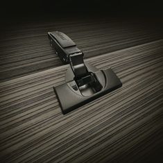 Charnière CLIP top BLUMOTION de Blum en Noir onyx
